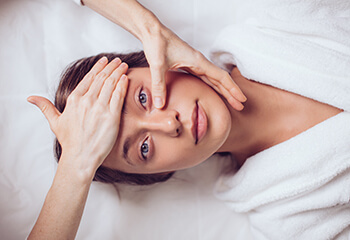 Woman laying down before a cosmetic procedure